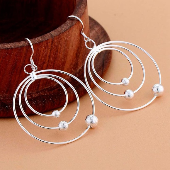 Сережки підвіски Сатурн срібні