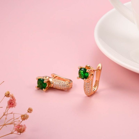 Сережки з циркону та зеленим кристалом