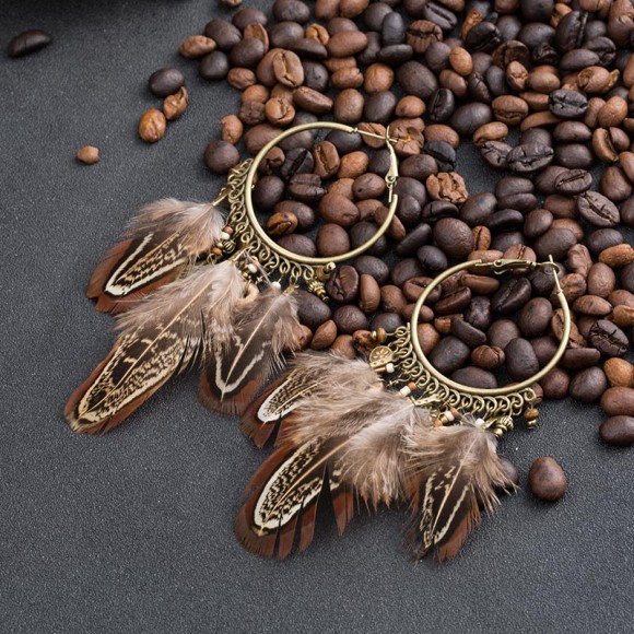 Сережки з пером бохо стиль Сережки з пером бохо стиль