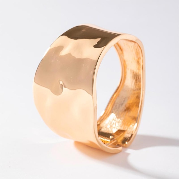 Металевий жіночий браслет гармонія вигинів блискучий