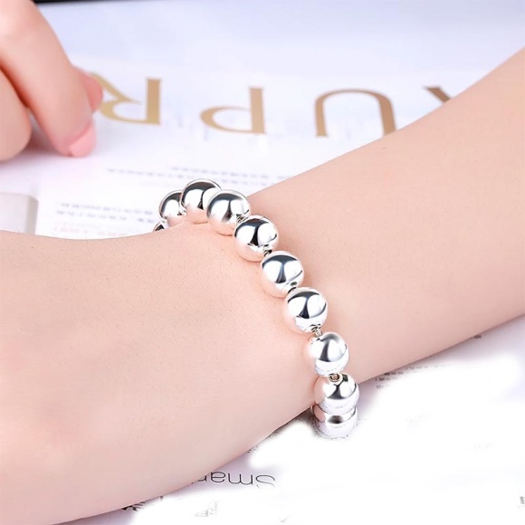 Браслет на руку кульки срібнений