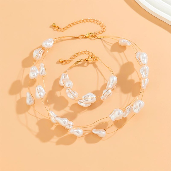 Набір прикрас з перлинними барочними намистинами кольє, браслет.