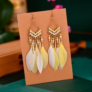 Винтажные серьги с перьями